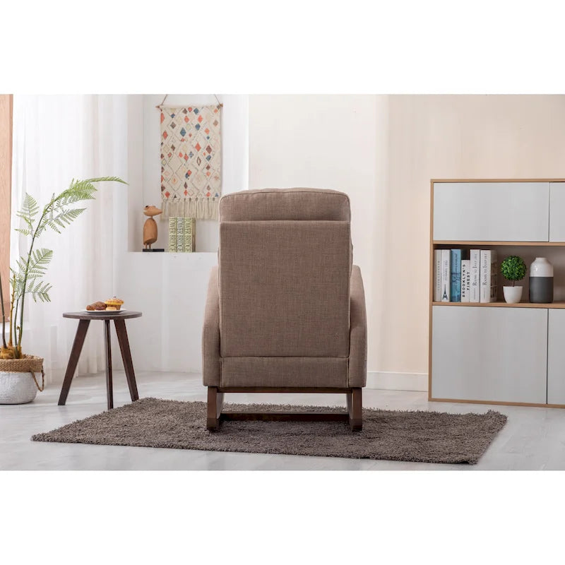 Fauteuil à bascule rembourré avec pieds en bois et poches latérales