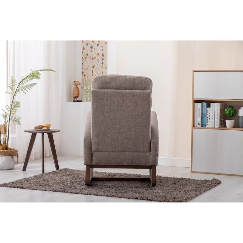 Fauteuil à bascule rembourré avec pieds en bois et poches latérales