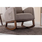 Fauteuil à bascule rembourré avec pieds en bois et poches latérales