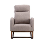 Fauteuil à bascule rembourré avec pieds en bois et poches latérales