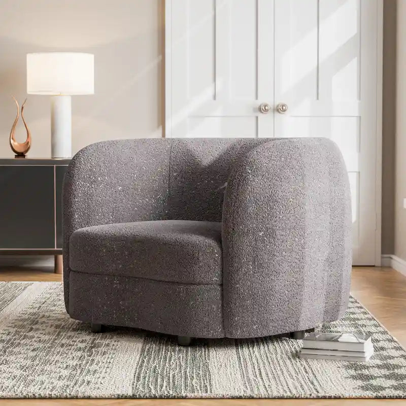 Fauteuil d'appoint moderne en bouclette avec accoudoirs incurvés, assise de style haricot et pieds ronds en bois