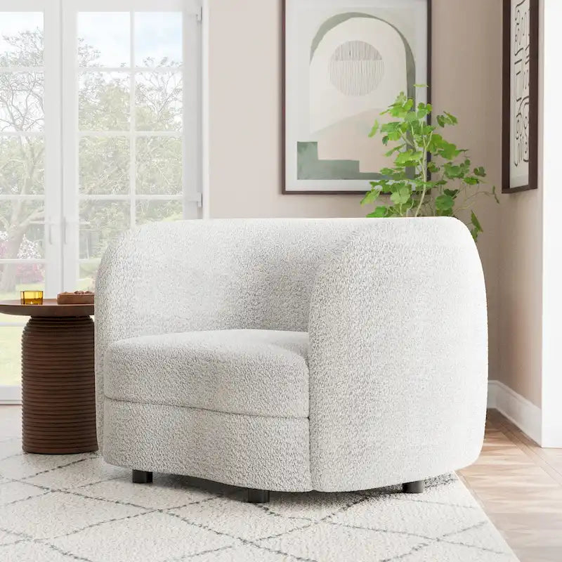 Fauteuil d'appoint moderne en bouclette avec accoudoirs incurvés, assise de style haricot et pieds ronds en bois