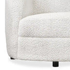 Fauteuil d'appoint moderne en bouclette avec accoudoirs incurvés, assise de style haricot et pieds ronds en bois