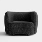 Fauteuil d'appoint moderne en bouclette avec accoudoirs incurvés, assise de style haricot et pieds ronds en bois