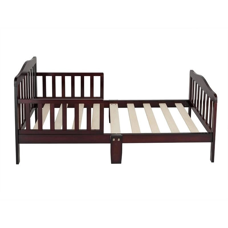 Lit d'enfant en bois avec barrières de sécurité