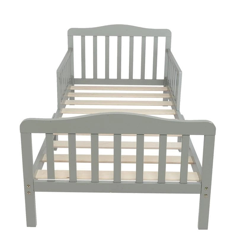 Lit d'enfant en bois avec barrières de sécurité