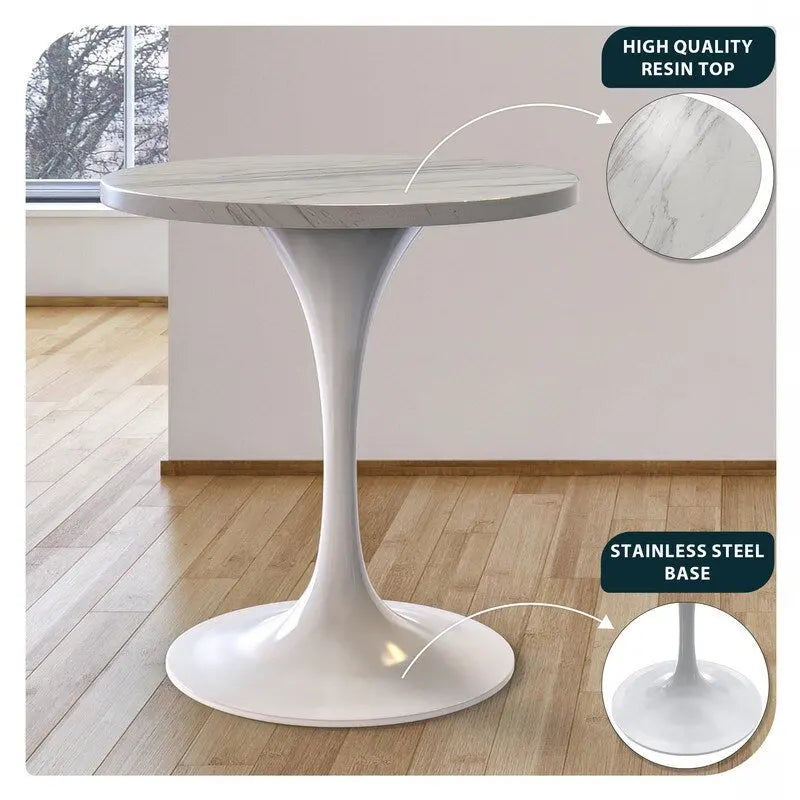 Table à manger ronde avec plateau en résine et piètement colonne en acier blanc