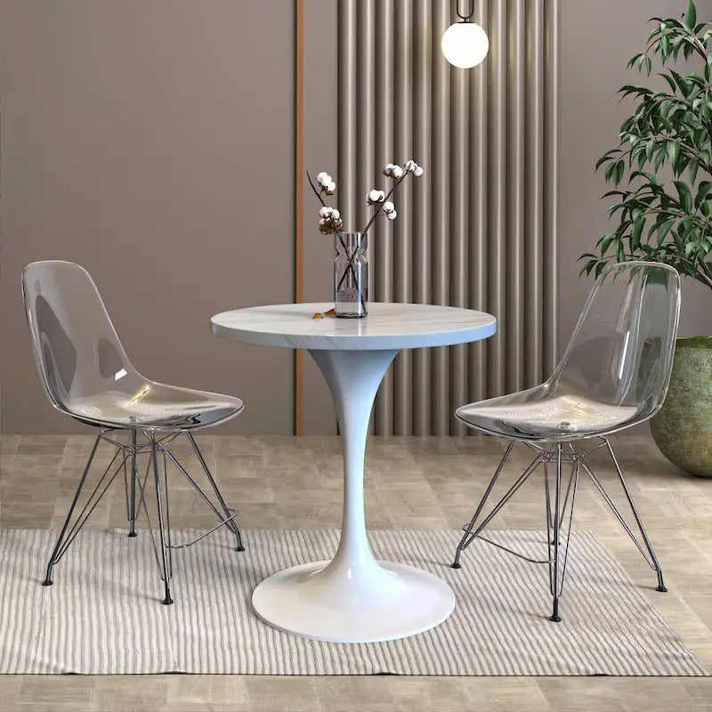 Table à manger ronde avec plateau en résine et piètement colonne en acier blanc
