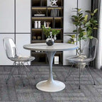 Table à manger ronde avec plateau en résine et piètement colonne en acier blanc