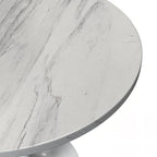 Table à manger ronde avec plateau en résine et piètement colonne en acier blanc
