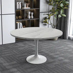 Table à manger ronde avec plateau en résine et piètement colonne en acier blanc