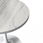 Table à manger ronde avec plateau en résine et piètement colonne en acier blanc
