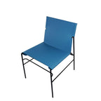 Chaise de salle à manger minimaliste en cuir avec surpiqûres bleues